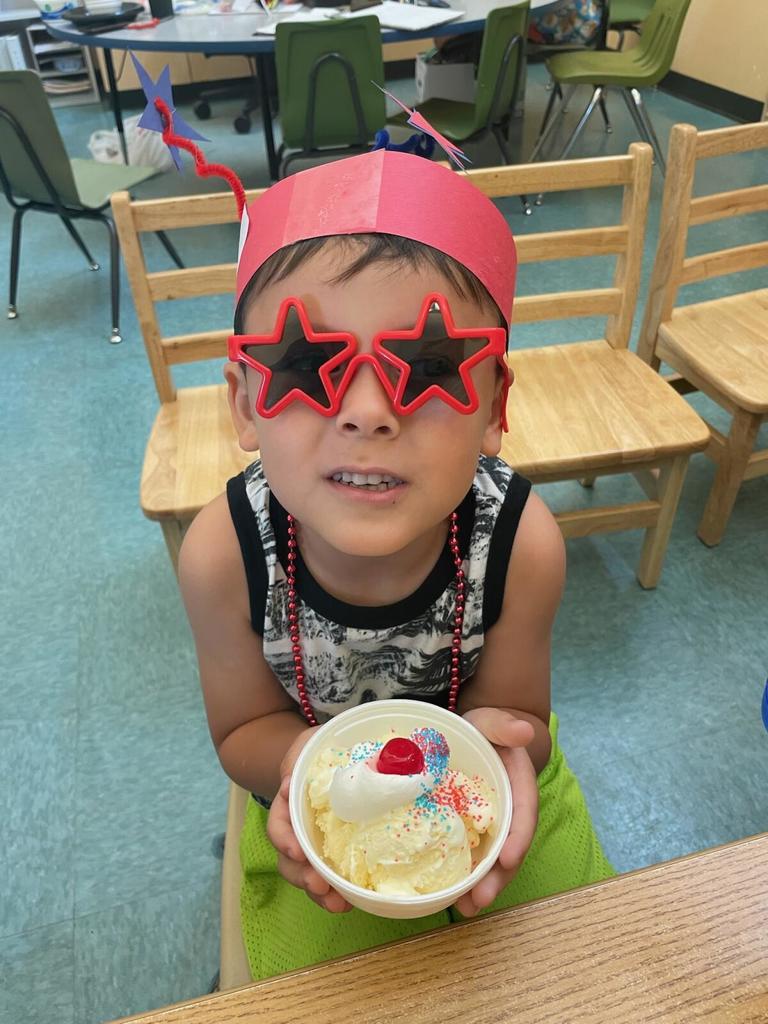 preschooler showing his ice cream