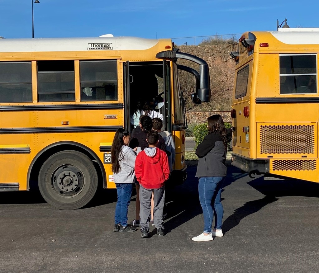 Students board the buses