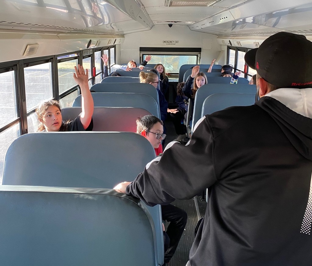 Drivers explain and demonstrate various safety features of the buses.